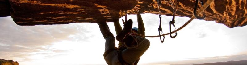 A trad climbing rack of wires, cams and quickdraws